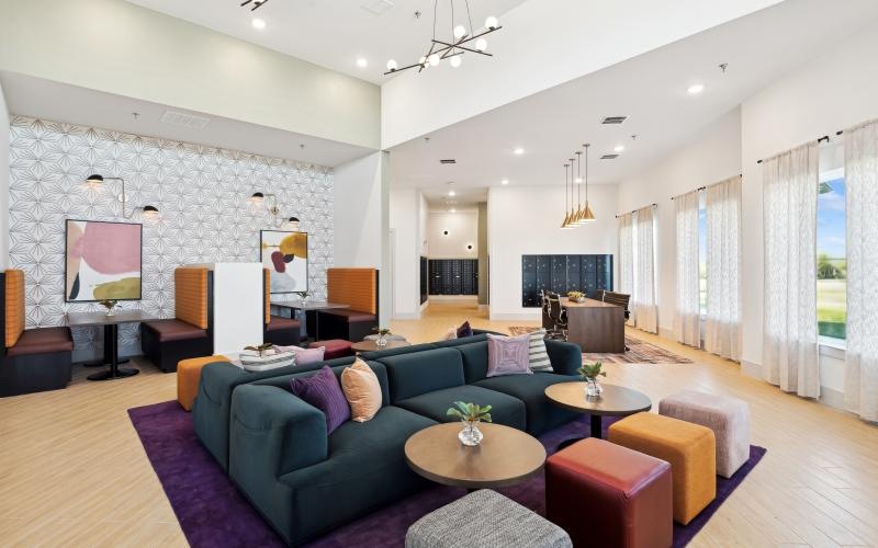 Beautiful clubroom with lounge seating and natural lighting