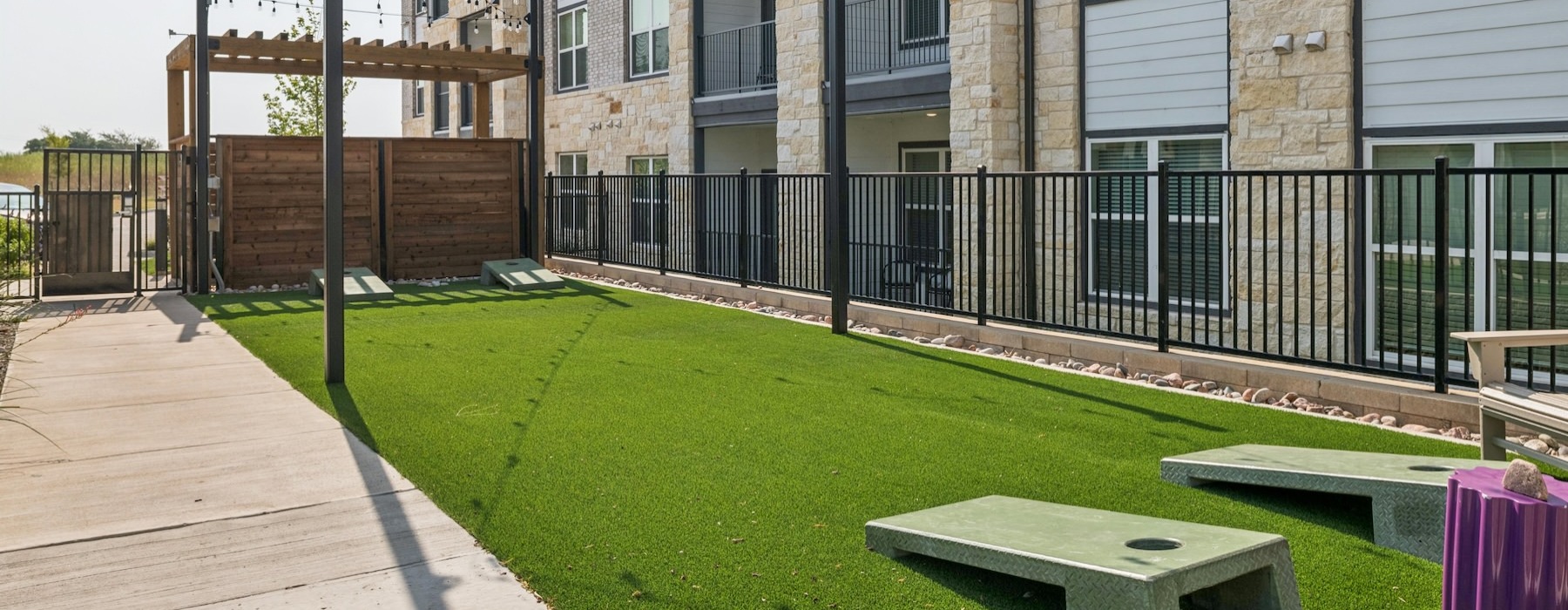 an activity field with corn hole