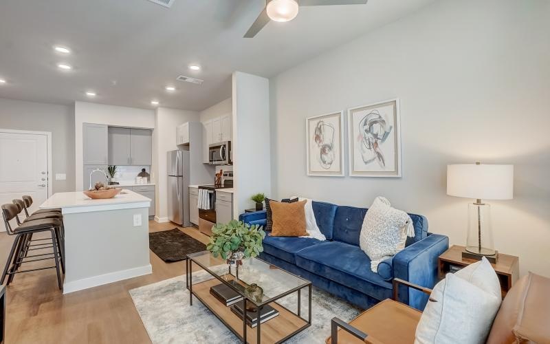 a living room with a blue couch